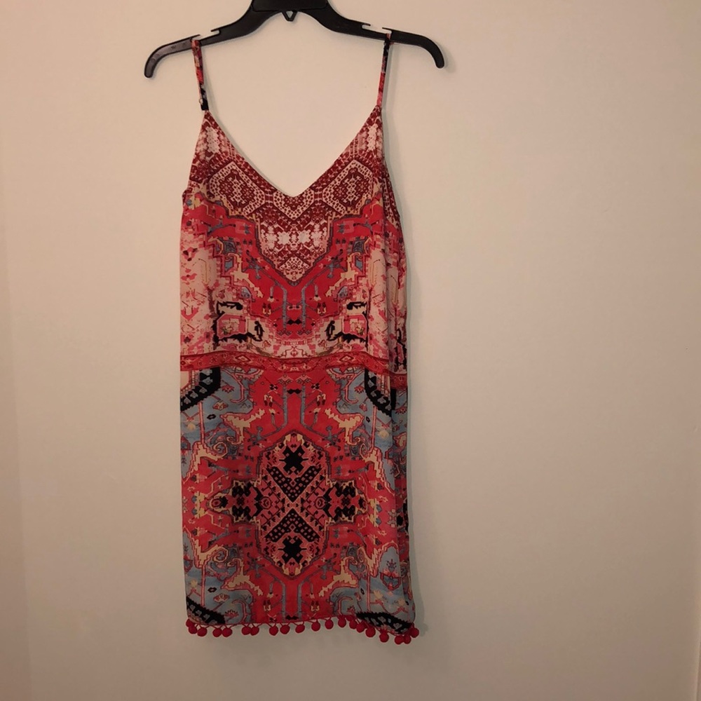 Cocktail dress with Pom poms on bottom